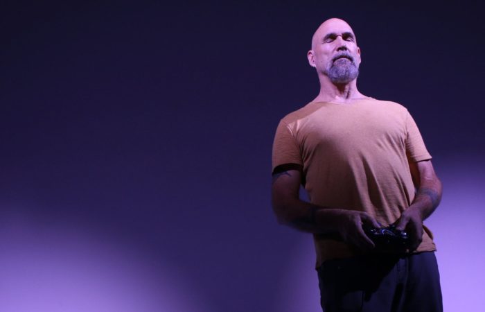 Bob Ostertag with eyes closed onstage