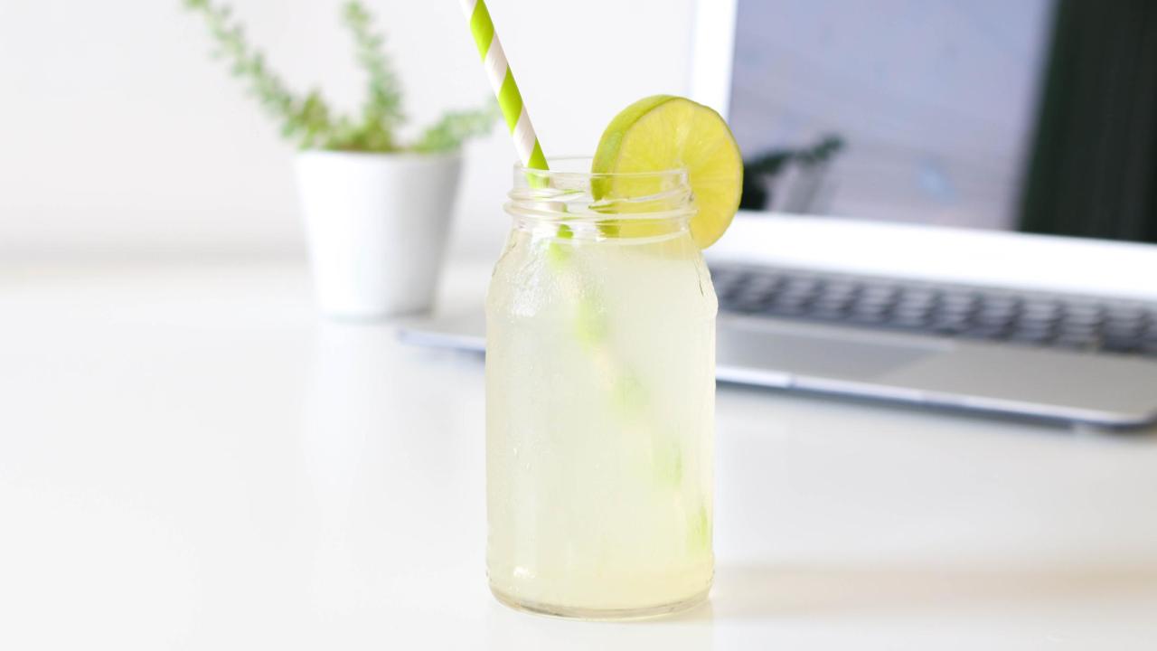 Image by J. Kelly Brito on Unsplash Glass of lemonade with a laptop in the background