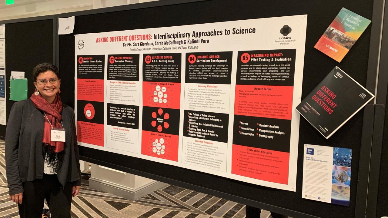 Sarah Messbauer with "asking different questions" poster