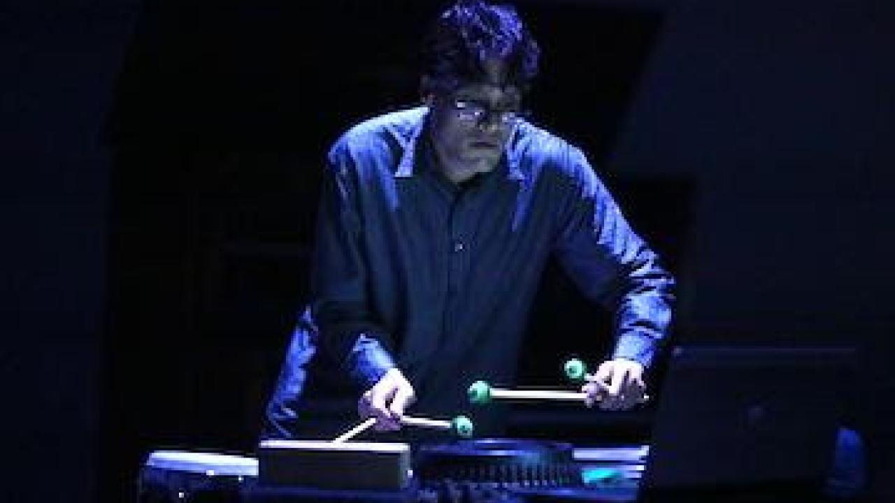 man playing marimba