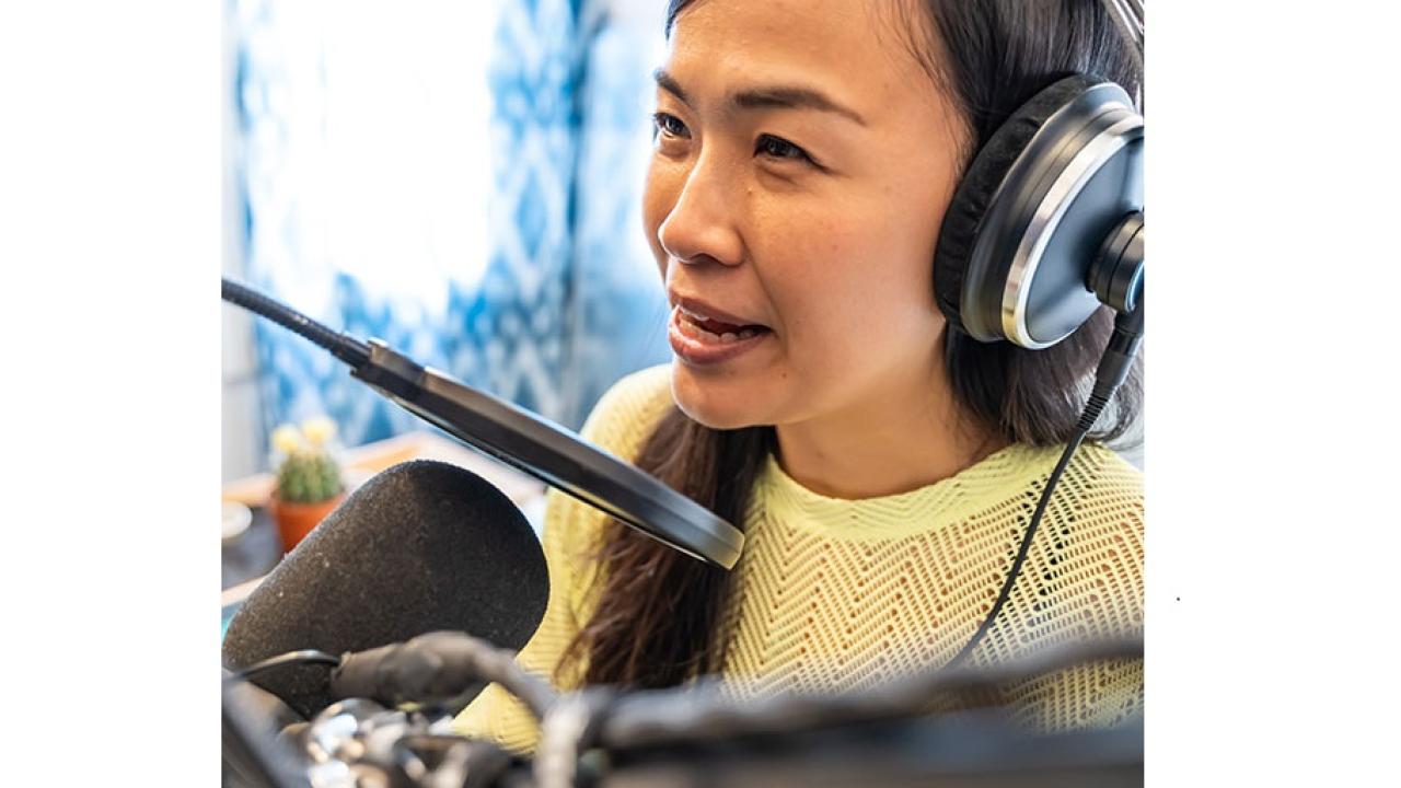 woman with headphones and microphone